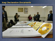 slide 10 photo of iraqi documents laid out on a table